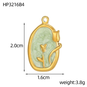 Detailed view of an oval gold tulip pendant with green enamel, sized 2.0x1.6cm