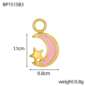 Detailed view of moon and star enamel pendant with size markings of 1.1cm by 0.8cm