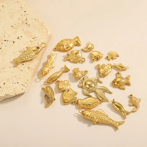 Golden stainless steel ocean koi fish and dolphin charms for DIY jewelry making