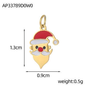 Detailed macro view of a 1.3cm handmade Christmas Santa enamel pendant with alloy loop