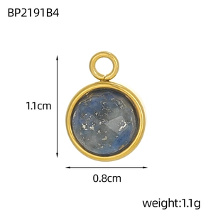 Macro detail of round lapis lazuli pendant with gold plated frame and size markings