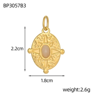Detailed size view of retro oval bohemian gold pendant with inset turquoise gemstone