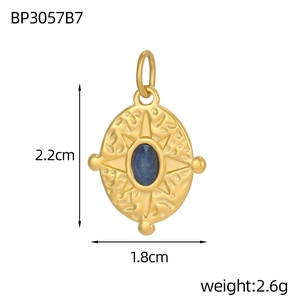 Detailed size view of retro oval gold pendant with engraved star and blue stone