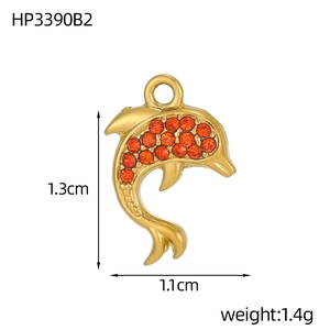 Detailed view of gold dolphin pendant with orange cubic zirconia and size dimensions