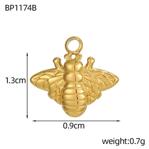 Detailed view of a gold bee pendant with measurements 1.3cm x 0.9cm and 0.7g weight