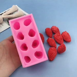 Pink 8-cavity strawberry silicone mold for candles and chocolates with realistic textures