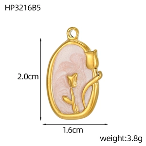 Detail view of a 2cm gold tulip pendant with pink enamel inlay and size measurements