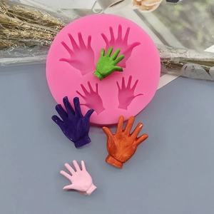 Pink silicone cake fondant mold featuring four palm shaped cavities for DIY baking
