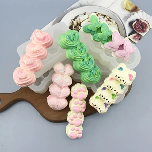 Silicone DIY mold for heart and cat paw shaped crafts featuring macaron color finishes