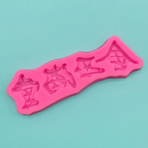 Macro shot of pink silicone mold with traditional Chinese lucky characters for baking