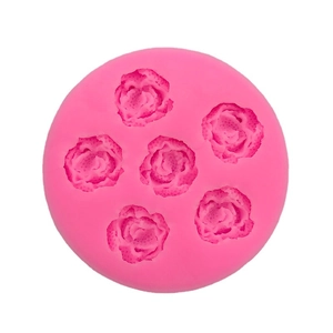 Pink silicone mold with six rose shapes for DIY baking, soap, and candle making