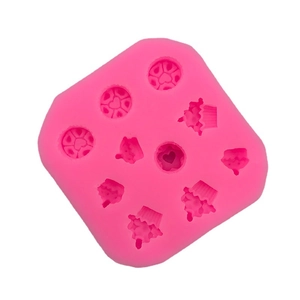 Pink silicone mold with heart and cupcake shapes for DIY fondant and chocolate crafts