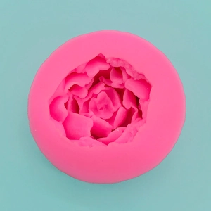Detailed top view of pink succulent-shaped silicone mold with layered petal textures