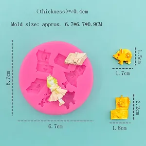 Pink silicone mold with Alice and pig motifs for fondant and clay craft decoration