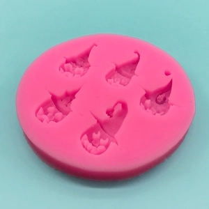 Pink silicone pumpkin gnome mold for Halloween cake decorating and DIY chocolate