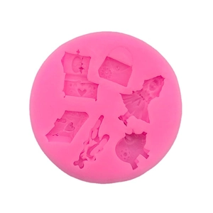 Pink silicone mold with heart, handbag, and pig shapes for fondant or resin DIY crafts