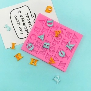 Pink silicone capital alphabet mold with floral patterns for DIY fondant and baking