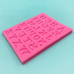 Pink silicone mold featuring 26 uppercase alphabet letters for fondant and DIY baking