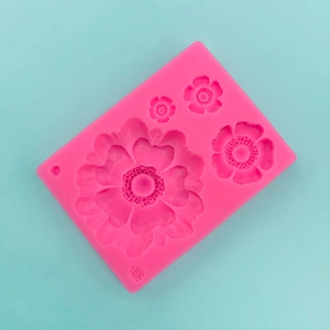 Detailed macro view of pink silicone flower mold for fondant cakes and handmade DIY soaps