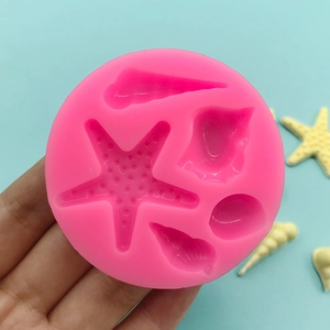 Pink starfish and seashell silicone mold for ocean-themed fondant and chocolate baking