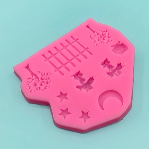 Pink silicone mold with moon stars and fence patterns for DIY cake fondant decorations