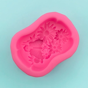 Pink silicone mold with sunflower and leaf patterns for DIY soap and cake crafts