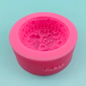 Pink silicone mold with traditional Chinese embossed patterns for New Year cake decorating