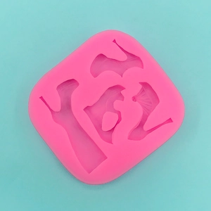 Pink silicone mold featuring three distinct high heel shoe shapes for DIY cake or resin crafts