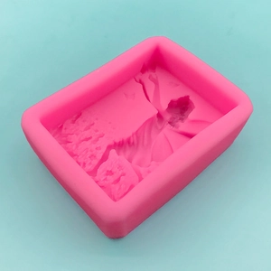 Pink rectangular silicone mold with relief angel girl design for soap and candle making