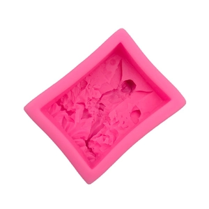 Rectangular rose red silicone mold with detailed angel and floral relief for DIY crafts