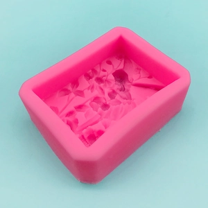 Pink rectangular silicone mold with 3D floral design for DIY soap and resin crafts