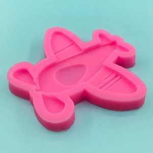 Airplane shaped pink silicone mold for DIY fondant cakes and chocolate candy making