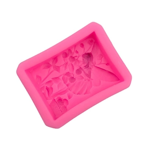 Pink rectangular silicone mold featuring a detailed angel and floral fruit-picking relief