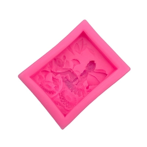 Pink silicone mold featuring an angel on a flower for soap and cake making