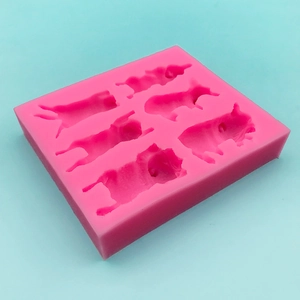 Pink 6-cavity silicone mold featuring cute sleeping puppy shapes for DIY baking and crafts