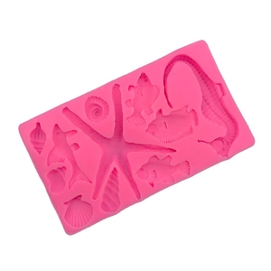 Pink marine life silicone mold featuring seahorse, starfish, and shells for DIY cake decor