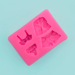 Pink silicone mold detail featuring bra, shirt, and skirt shapes for DIY crafts