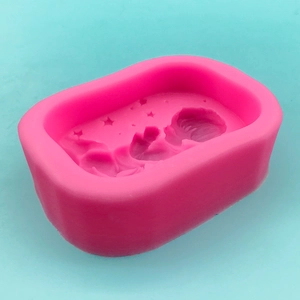 Pink silicone angel soap mold with star relief detail for creative DIY candle making