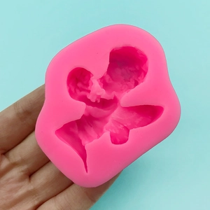 Pink silicone mold with a cute angel and bouquet design for DIY handmade soap or cakes