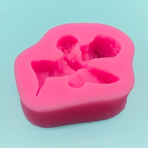 Pink silicone angel mold for DIY soap, cake decoration and gypsum craft projects
