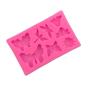 Pink silicone mold featuring butterfly and ladybug shapes for baking and DIY crafts