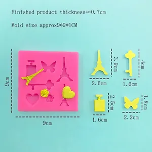 Stampo in silicone rosa per decorazioni in fondente torre Eiffel e farfalla e cioccolato