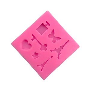 Stampo in silicone rosa con disegni di Torre Eiffel, farfalla e boccetta di profumo per fai da te