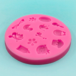 Pink silicone baby shower mold for DIY cake decorating with bottle and cradle patterns