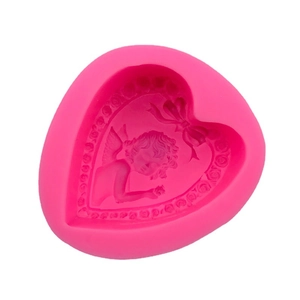 Pink heart-shaped silicone mold featuring angel, rose garland and bow for soap making