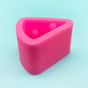 Detail view of pink silicone cheese mold with double hemispherical cavities for DIY mousse cake