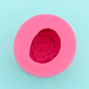 Macro top view showing the intricate petal details of a pink silicone 3D rose flower mold