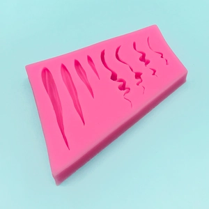 Pink silicone mold for DIY fondant cake decoration and hair styling texture tool