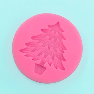 Macro shot of pink silicone Christmas tree mold for fondant and chocolate baking DIY