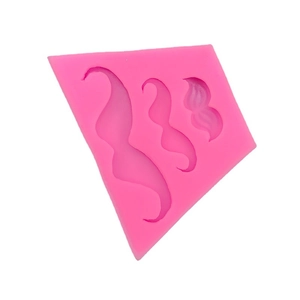 Pink silicone mold featuring three mustache and horn designs for fondant and DIY baking